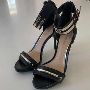 Gianni Bini black heels with gold accents